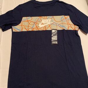 Boys Nike size L tee.